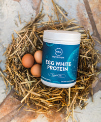 MRM Egg White Protein Chocolate mixing bowl with powder for a shake