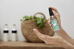 Mrs. Meyer's Basil sanitizer front hero image showing product focus.