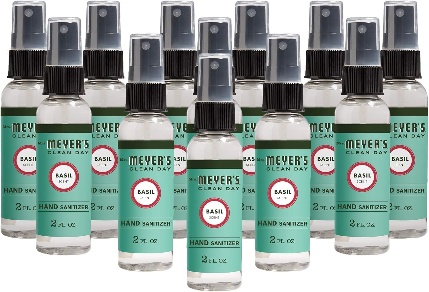 Mrs. Meyer's Basil sanitizer spray bottle close-up for quick on-the-go cleansing.