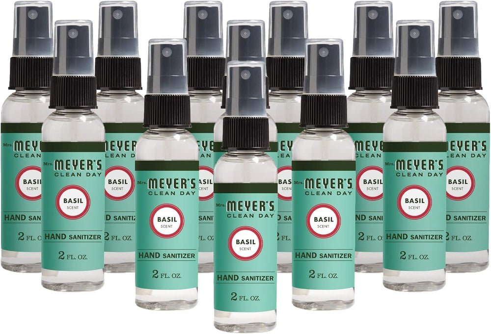 Mrs. Meyer's Basil sanitizer spray bottle close-up for quick on-the-go cleansing.