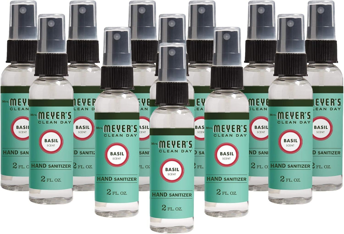 Mrs. Meyer's Basil sanitizer spray bottle close-up for quick on-the-go cleansing.