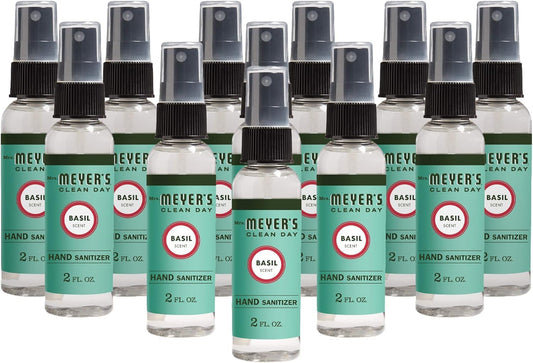 Mrs. Meyer's Basil sanitizer spray bottle close-up for quick on-the-go cleansing.