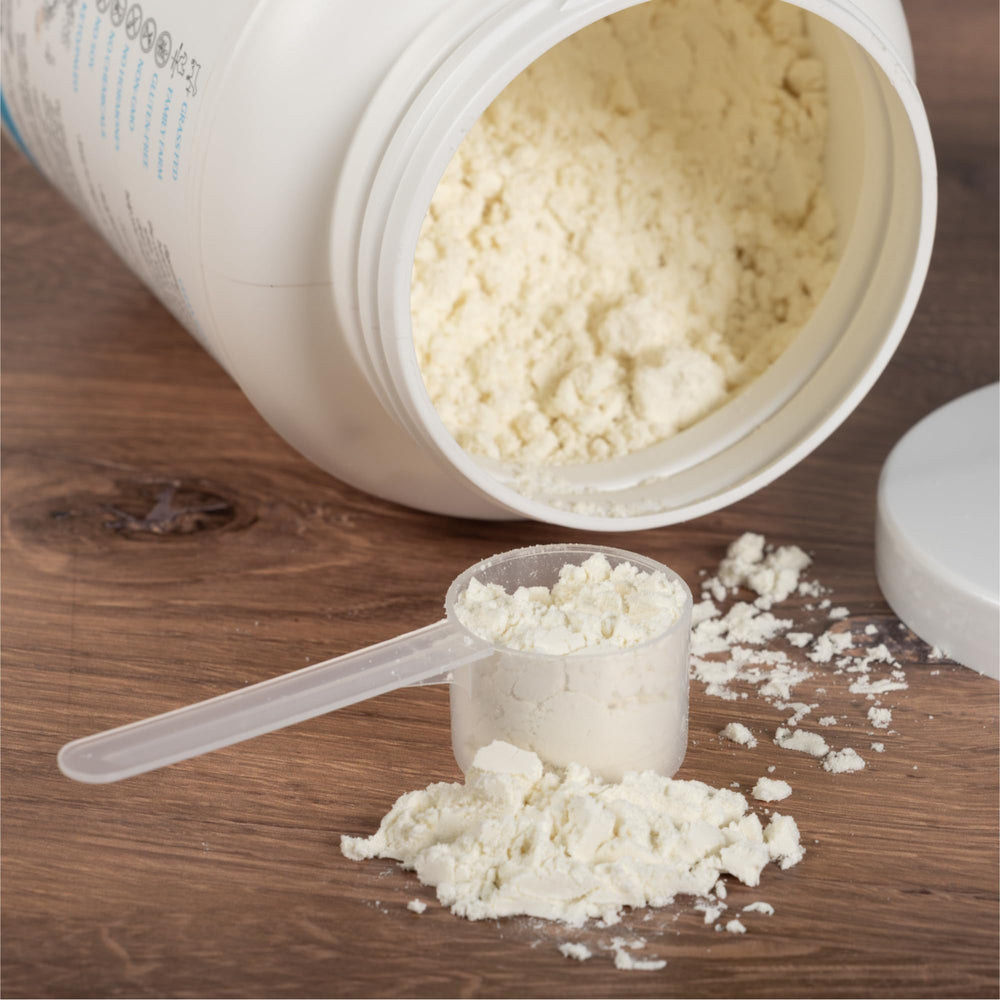 Mt. Capra Clean Whey bottle close-up with natural, unsweetened protein.