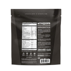 MTN OPS Slumber warm mug with gentle steam in a calm bedroom.