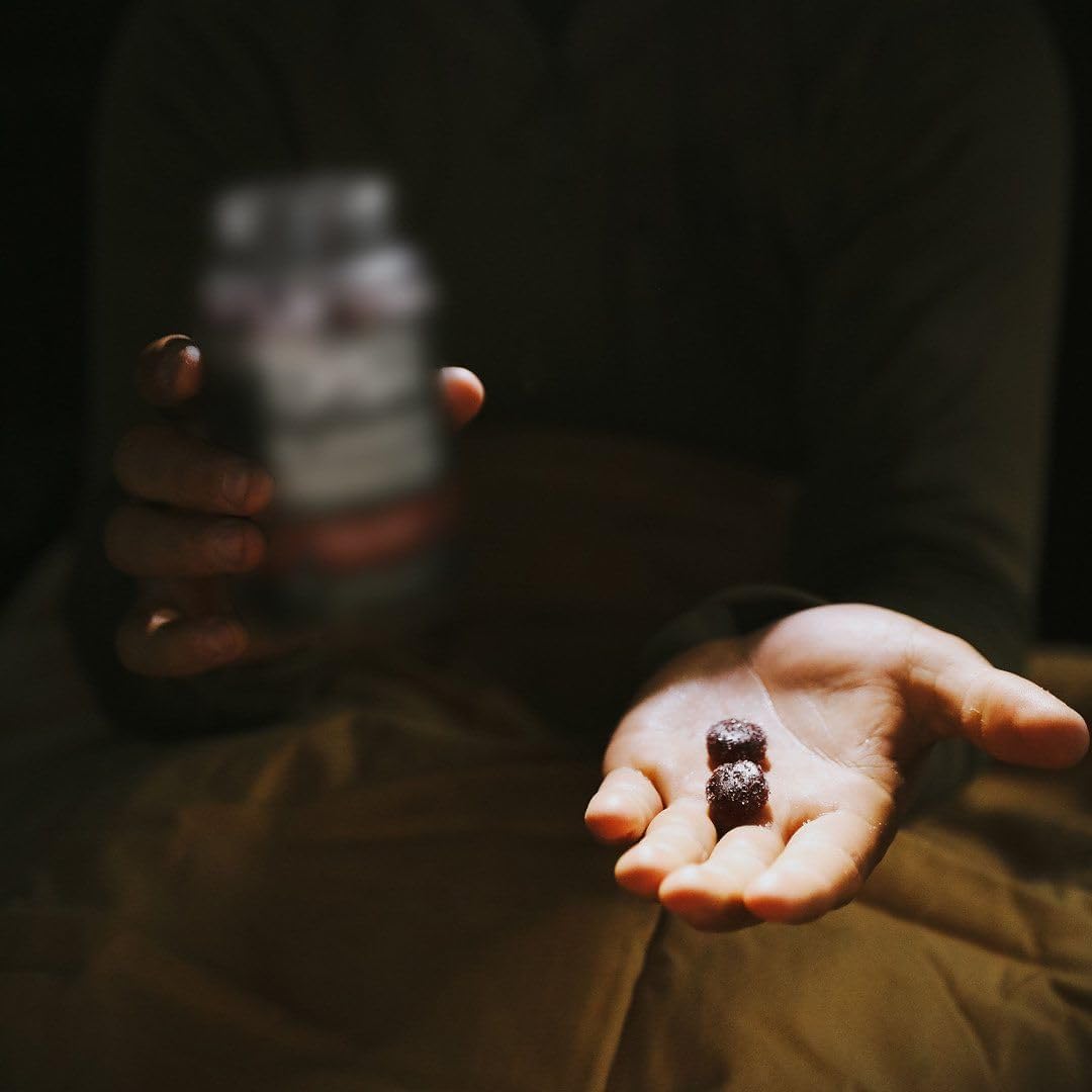 MTN OPS Slumber Gummies texture close-up illustrates an easy-to-chew night routine.