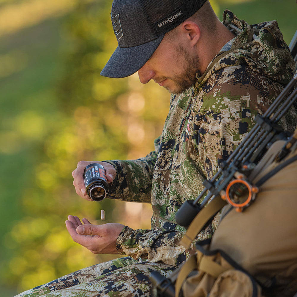 MTN OPS Solitude packaging display with Golden Root and Schisandra imagery for altitude support.