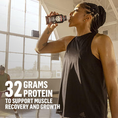 Pour-action shot of Muscle Milk Pro showing smooth texture.