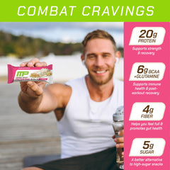 MusclePharm Confetti Cake bite closeup delivering chewy-crisp texture