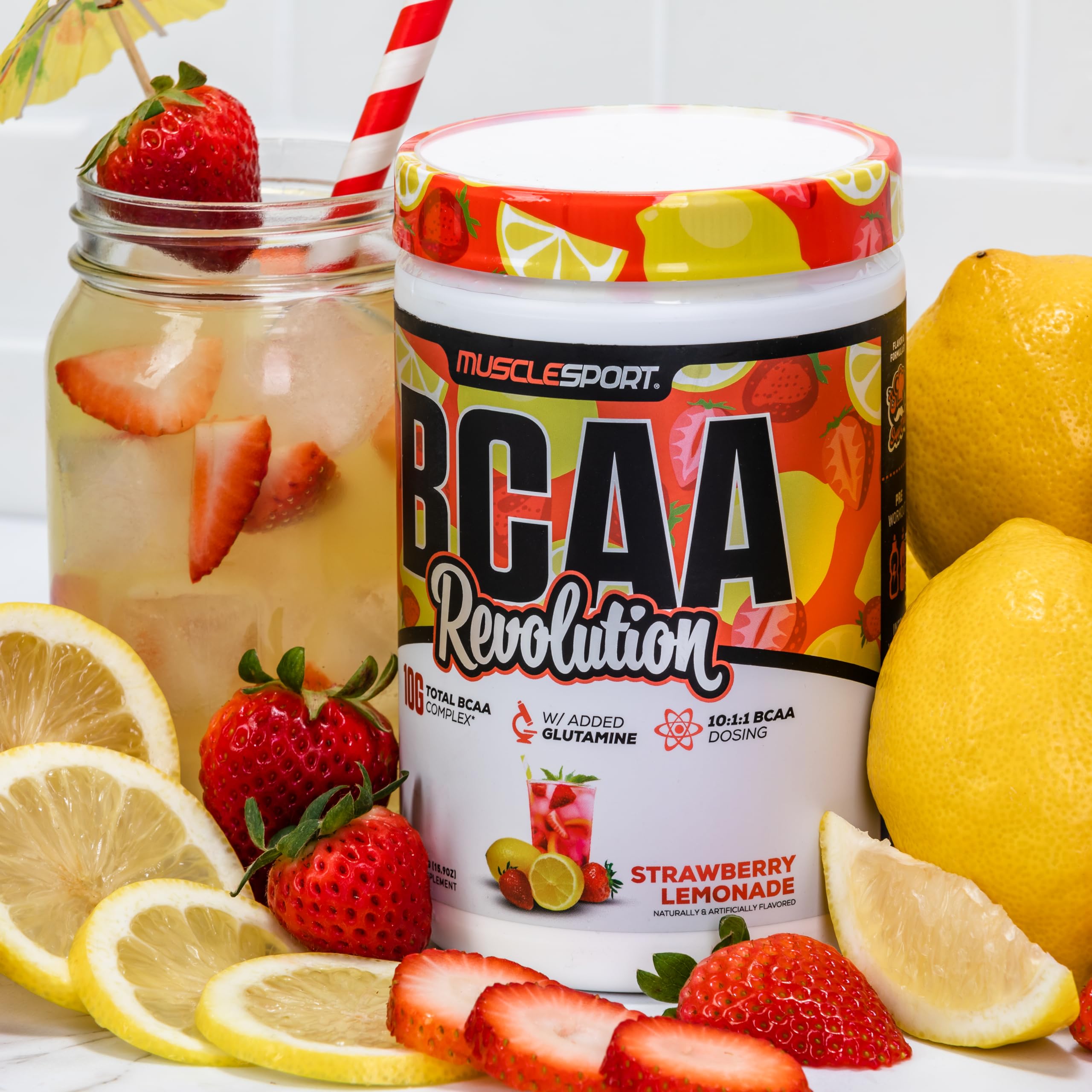 Musclesport BCAA Revolution strawberry-lemonade color pouring into shaker