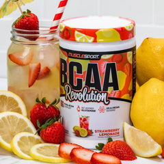 Musclesport BCAA Revolution strawberry-lemonade color pouring into shaker