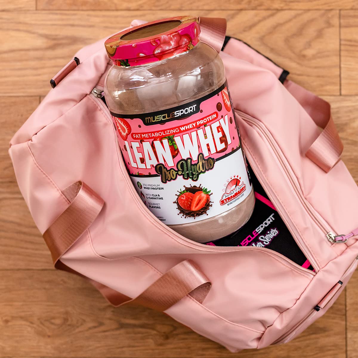 Musclesport Lean Whey Revolution shake glass showing smooth mix.