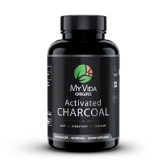 My Vida Origins bottle with activated charcoal capsules promotes gentle detox support.