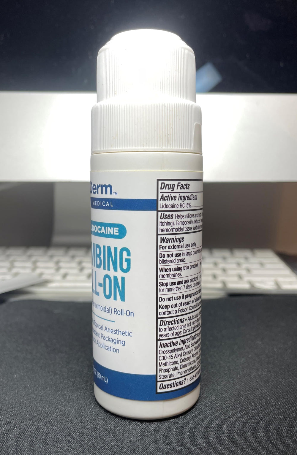Compact Myderm bottle packaging ideal for travel and care.