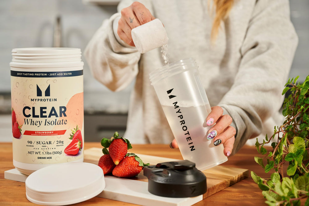 Myprotein Clear Whey Isolate Strawberry dissolve close up demonstrates fast mixing with cold water