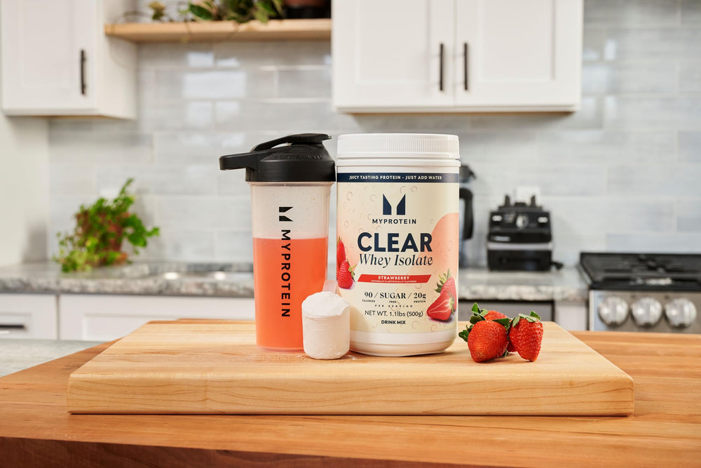 Myprotein Clear Whey Isolate Strawberry glass shows thirst-quenching protein during training