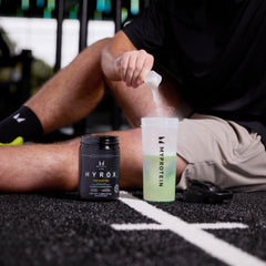 Glass with lemon-lime drink shows refreshing hydration after running