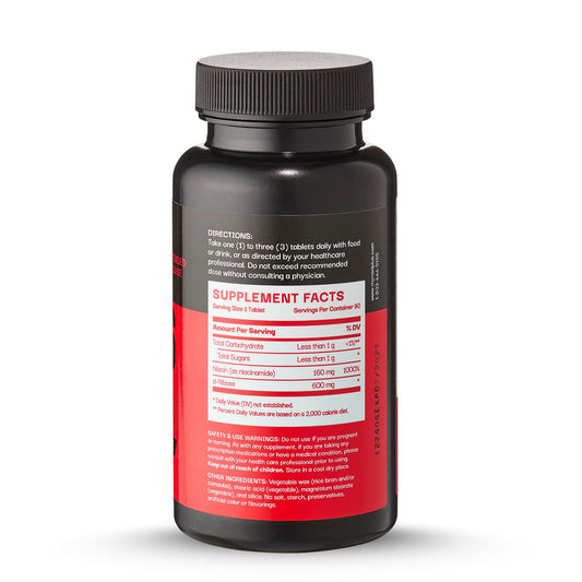 NAD Plus Revive tablets close-up showing smooth, oval capsules.