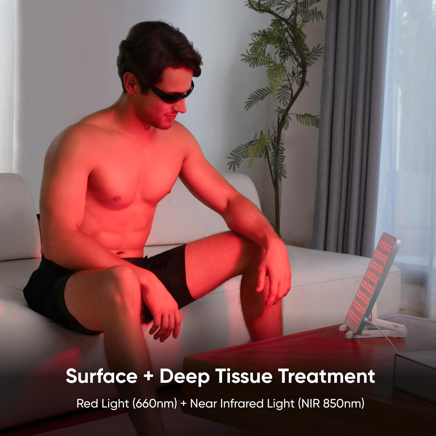 Nanoleaf red light therapy panel in seated position delivering targeted therapy at home