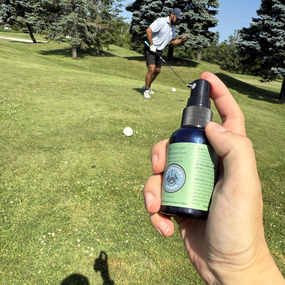 Outdoor use scene with spray in hand during hiking