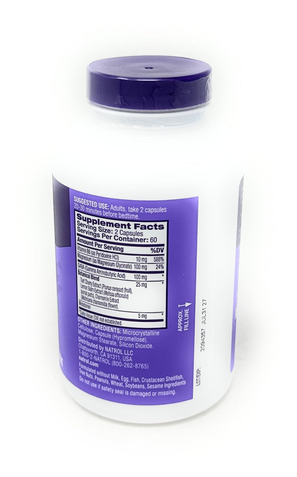 Natrol Sleep & Restore capsules close-up highlighting melatonin blend