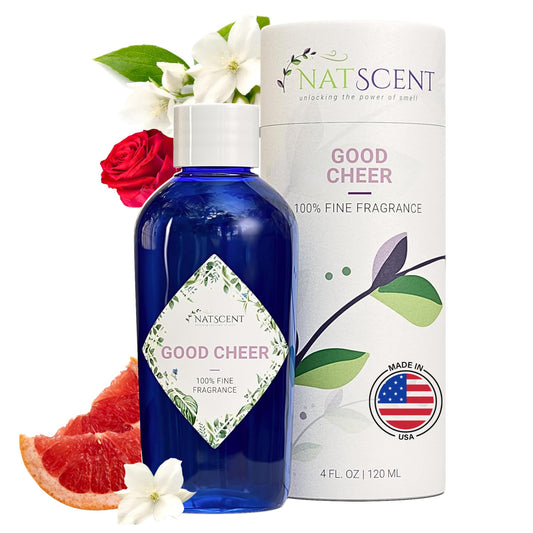 Natscent Good Cheer bottle pour with citrus zest for an uplifting diffusing moment.