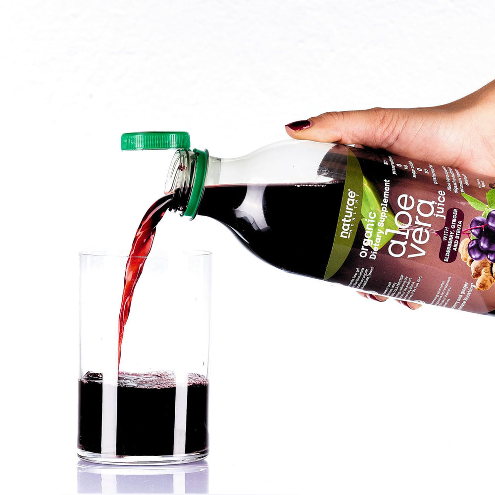 Closeup of Naturae Aloe Vera Juice liquid highlighting purity and aloe gel.