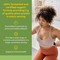 Natural Factors organic fermented greens powder with a scoop for easy mixing and daily nutrient support.