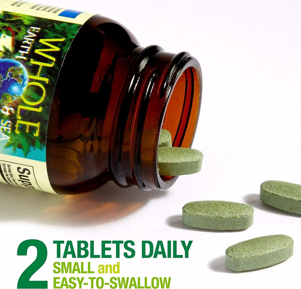 Natural Factors prenatal multivitamin packaging displayed on a clean surface.
