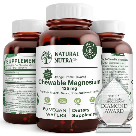 Natural Nutra magnesium bottle on a kitchen counter highlighting 125mg per wafer for daily support.