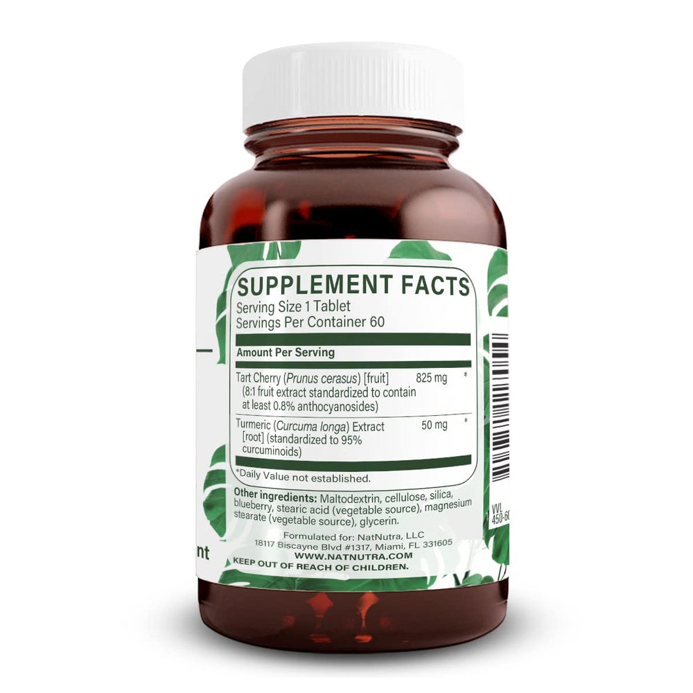 Natural Nutra Tart Cherry extract capsules close-up with turmeric curcumin blend