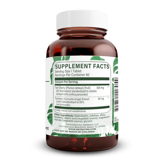 Natural Nutra Tart Cherry extract capsules close-up with turmeric curcumin blend