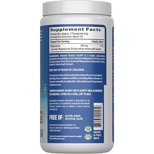 Natural Vitality CALM powder scoop dissolving in water for a cherry drink.