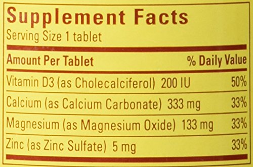 Nature Made calcium magnesium zinc tabs tablets close-up for daily mineral intake