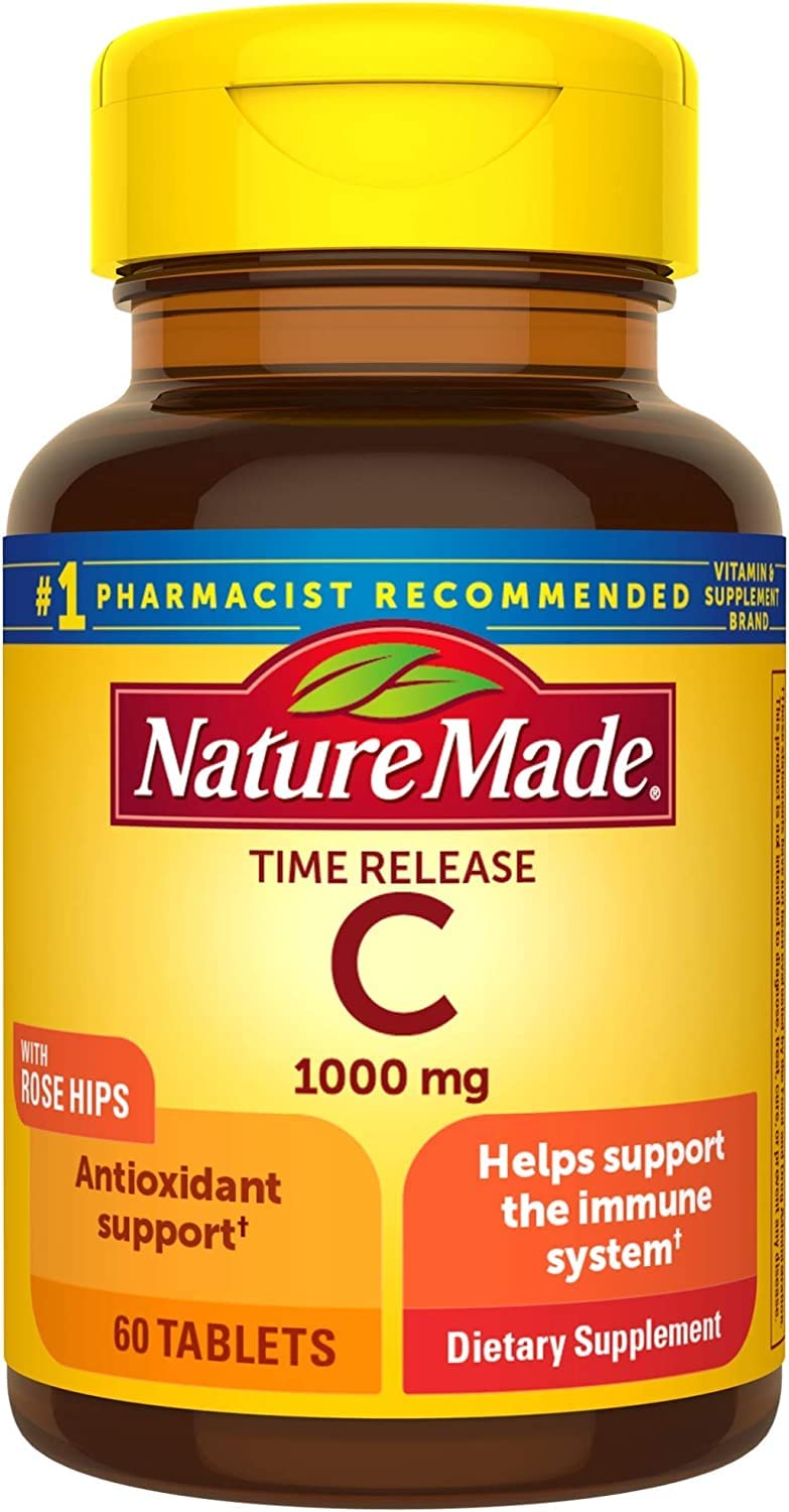 Close-up of Nature Made Time-Release Vitamin C tablets with rose hips for daily wellness.