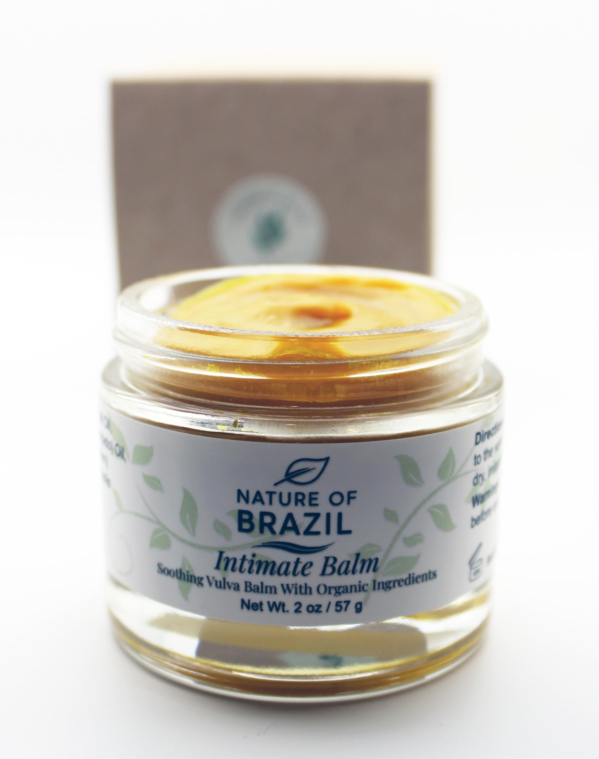 Nature of Brazil Vulva Balm ingredients close-up highlighting organic oils and honey