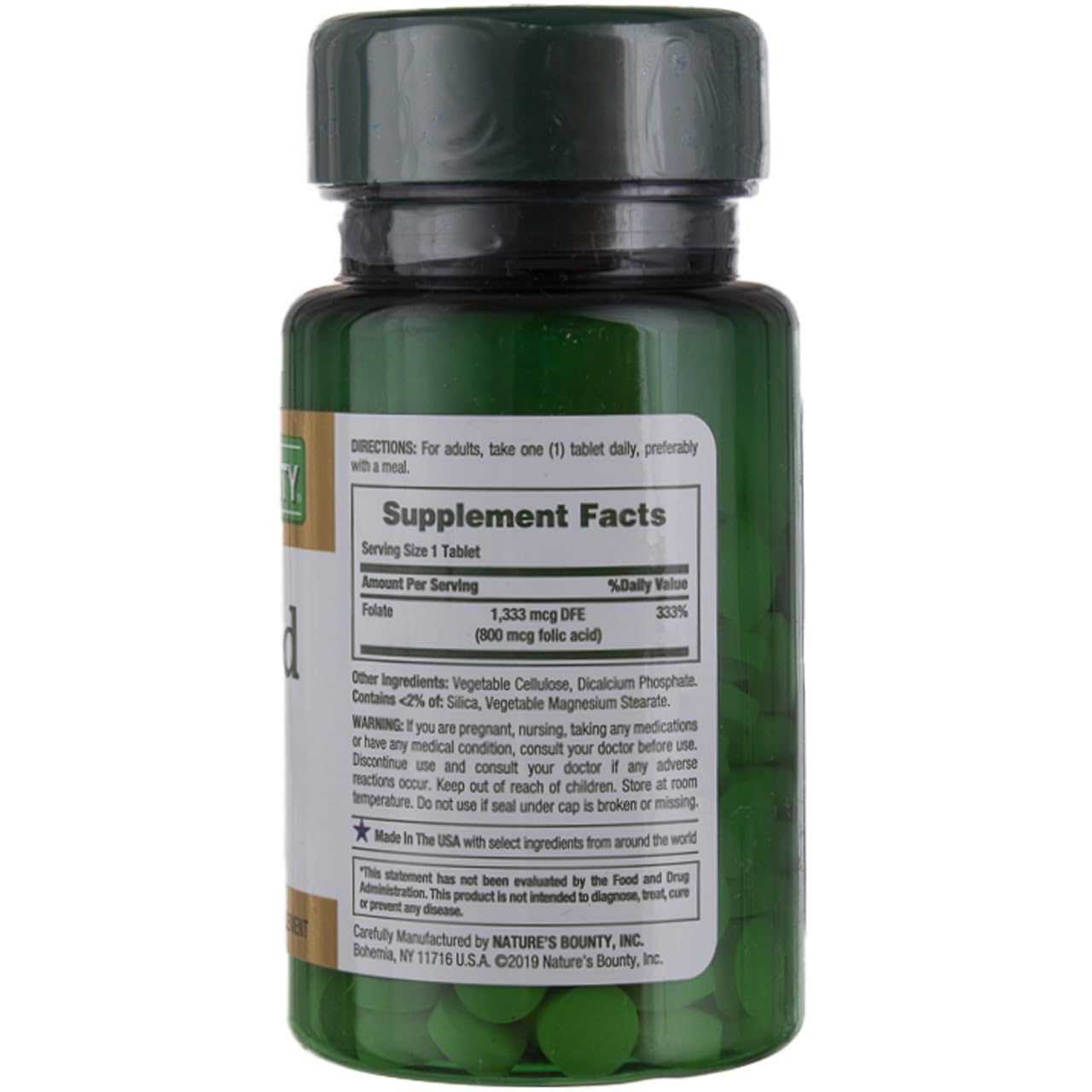 Closeup of Nature's Bounty Folic Acid 800 mcg tablets highlighting maximum strength formulation.