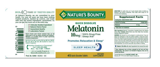 Nature's Bounty Melatonin tablet close-up shows fast-dissolve action.