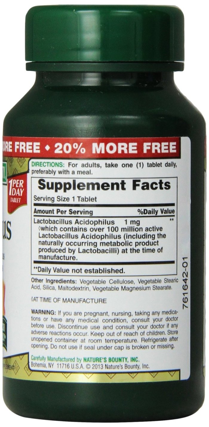 Nature's Bounty probiotic tablets bottle with capsules swirl for daily gut support.