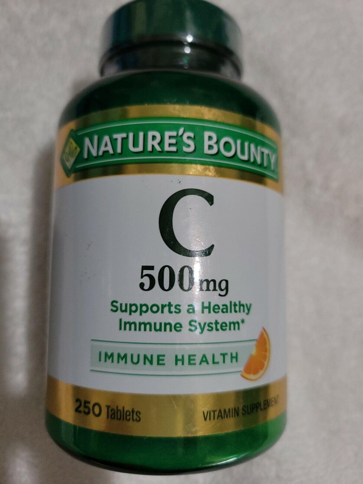Nature's Bounty Vitamin C 500 mg tablets close-up pill, ready for daily immune support