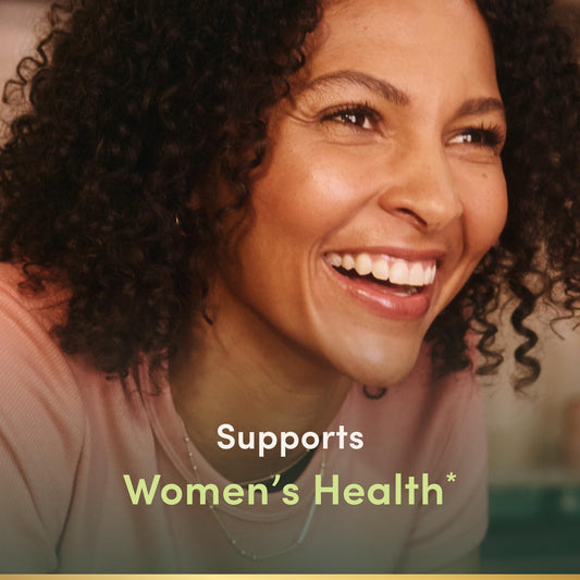 Nature's Bounty Women's Multivitamin caplets close-up highlighting easy-to-swallow vitamins.