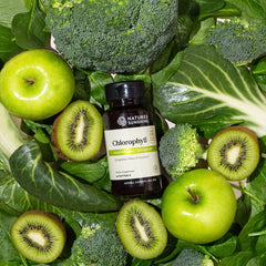 Nature's Sunshine Chlorophyll capsules on a clean surface.