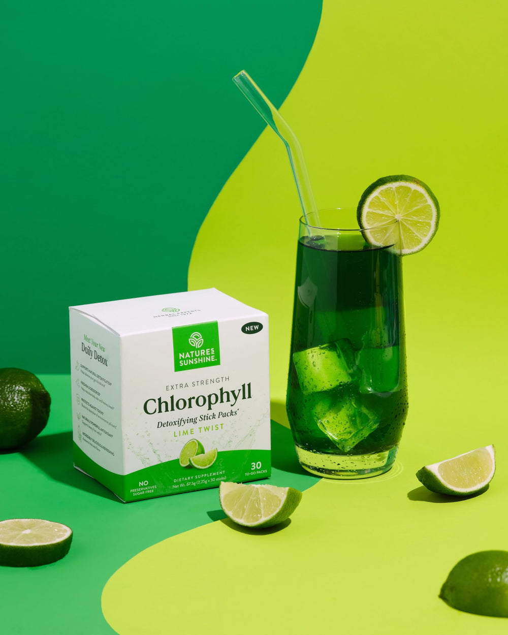 Glass with lime twist chlorophyll stick ready for hydration and wellness