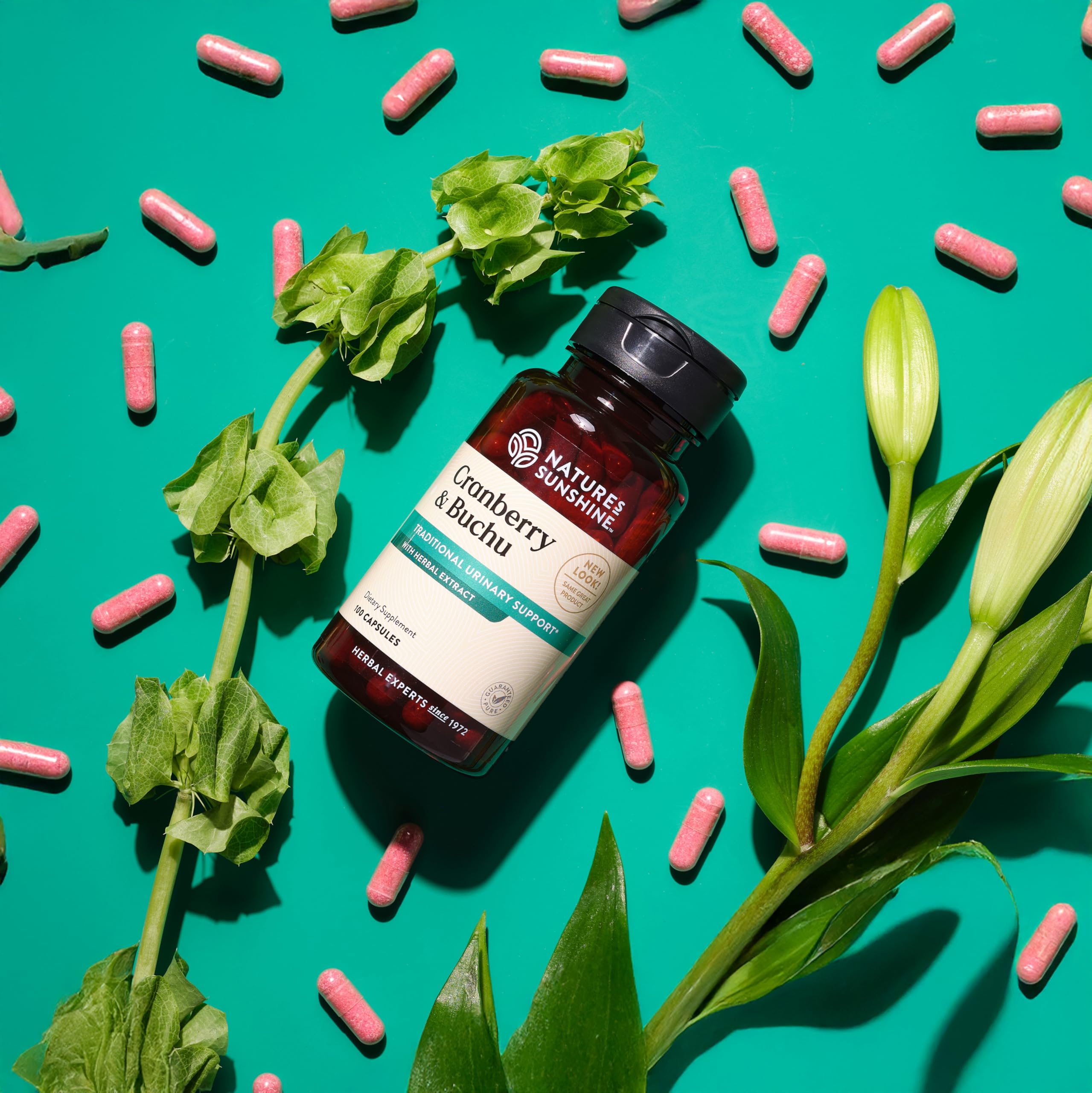 Capsules resting beside Nature's Sunshine bottle for everyday routine.