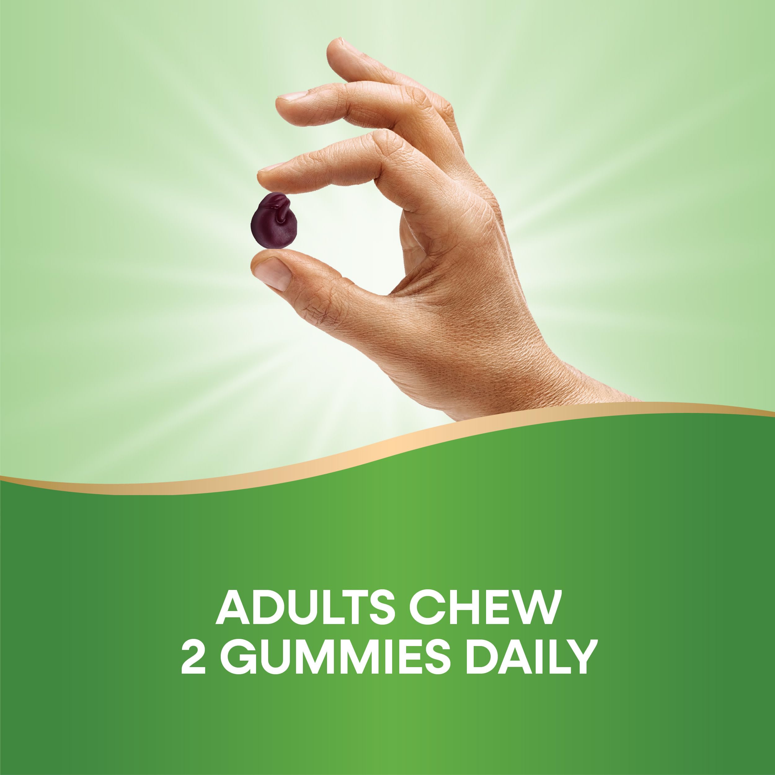 Person taking Nature's Way CranRx gummies as part of daily routine