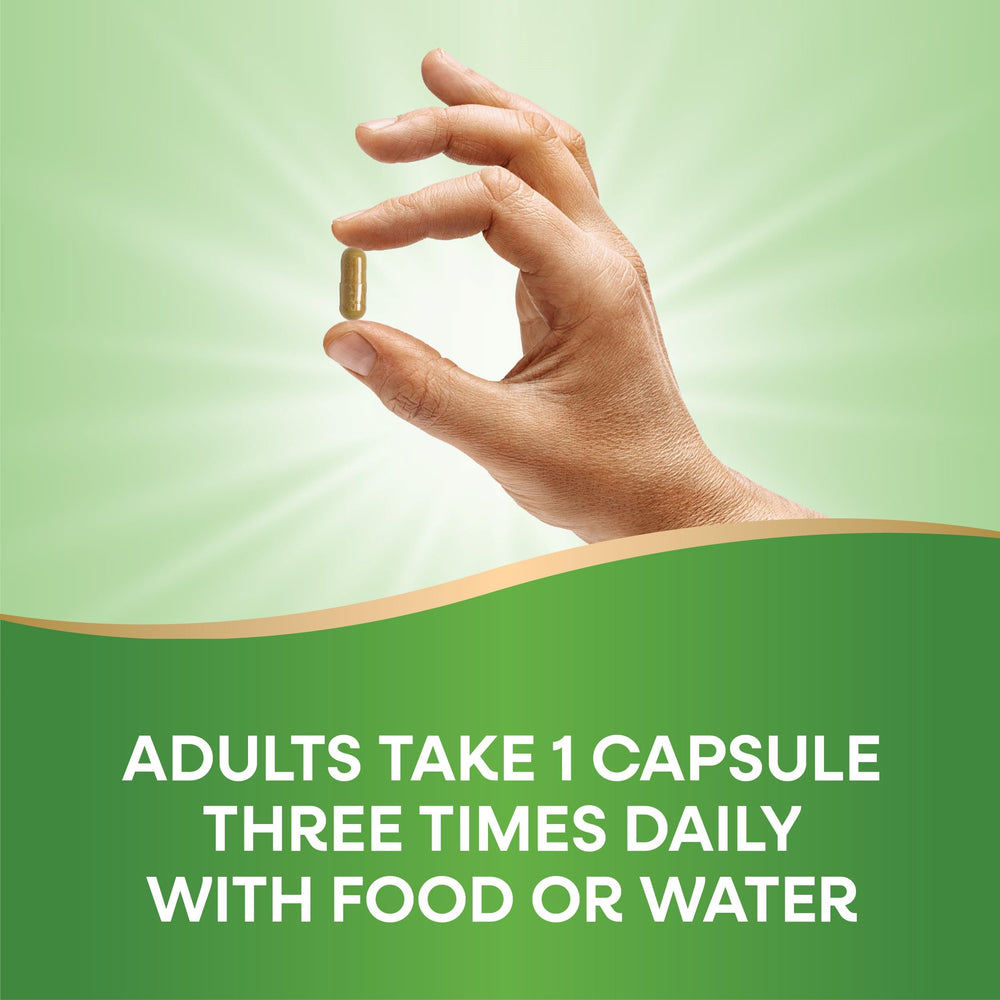 Nature's Way Milk Thistle capsules beside a meal for convenient dosing.
