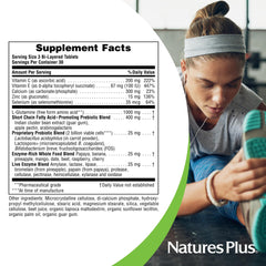 Close-up of round bi-layered tablets from NaturesPlus GI Natural package.