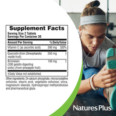 NaturesPlus Quercetin Plus bottle pour into glass.