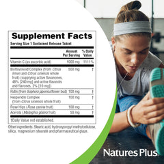 Nature's Plus Super C Complex bottle held in hand for everyday immune support