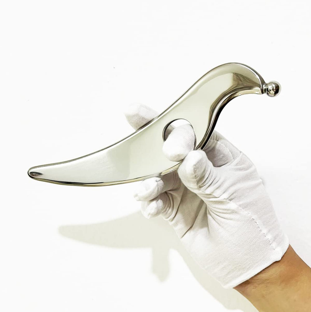 NCCYOOT gua sha tool held for precise muscle scraping and tension relief.