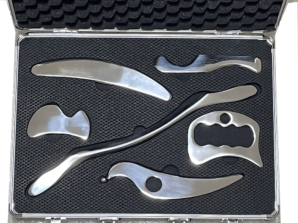 NCCYOOT six-piece gua sha set in polished steel for smooth, controlled massage.